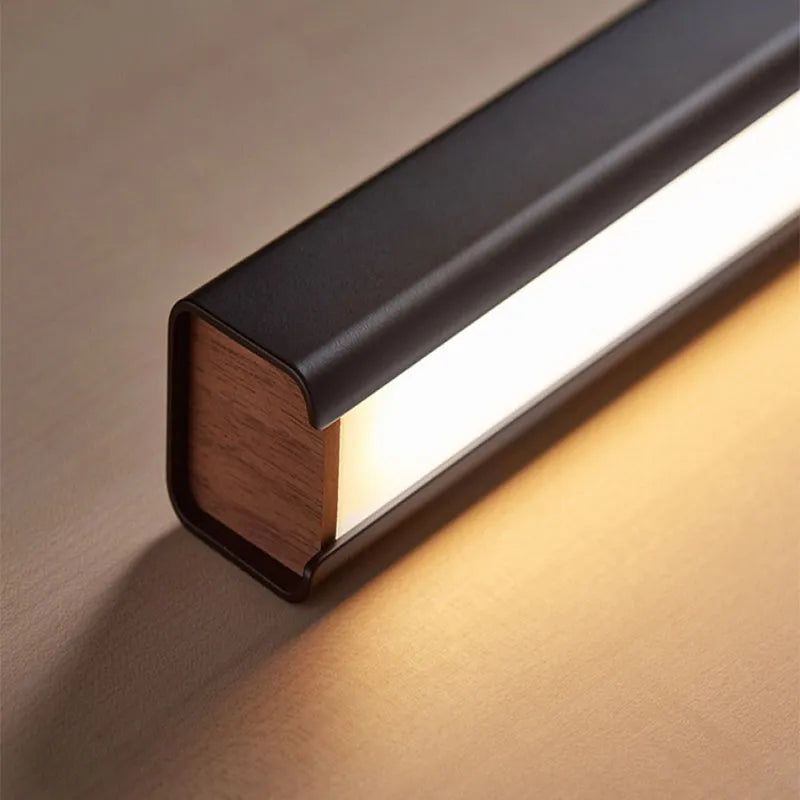 Minimalist Black Linear Pendant Light Wood-Grain End Detail